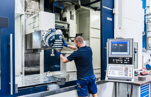 man-working-on-machine